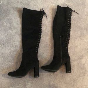Thigh high boots with lace up detailing